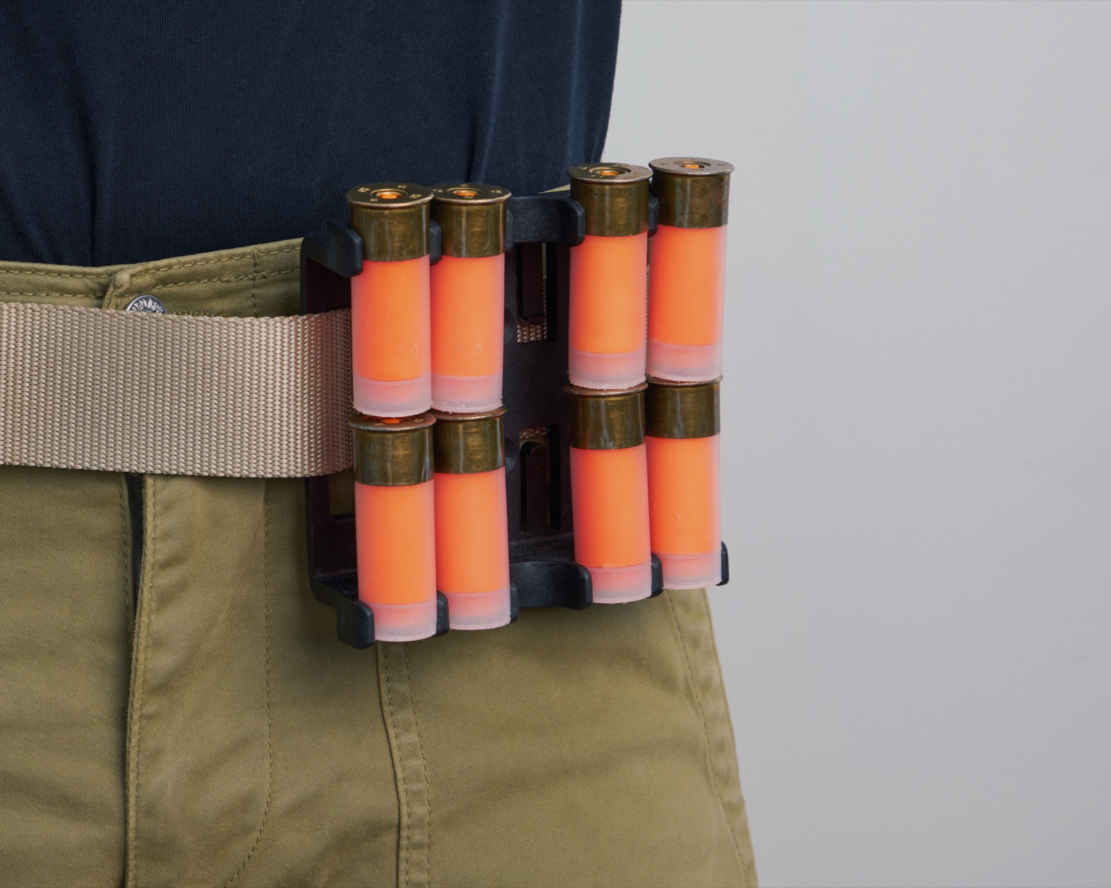 Johnny Clip 2x4 worn on a belt, loaded with eight shells