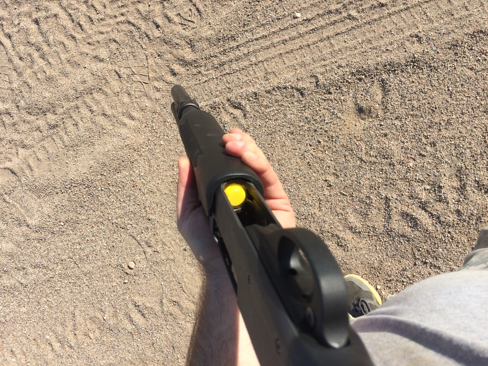 The KISS 12 GA SFLR REM shotgun follower in canary yellow